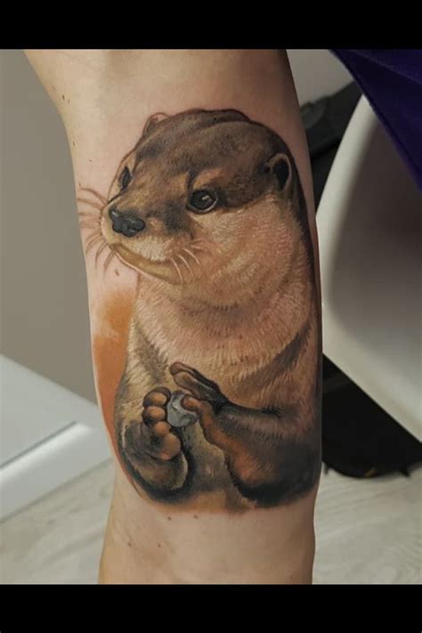 Flowers have been a popular design choice for tattoos for centuries, with each flower symbolizing different meanings and emotions. . Otter tattoo